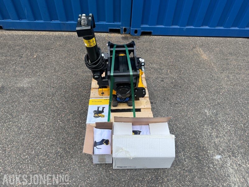 Engcon tiltrotator attachment arriving on a pallet